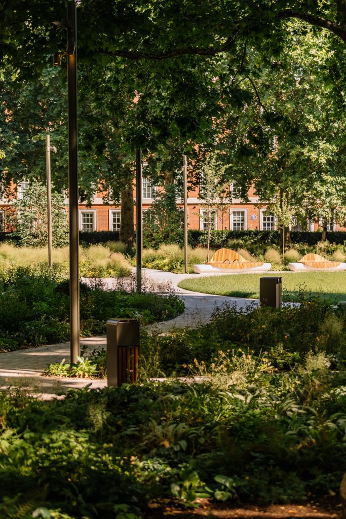 Curved paths shown in the sunlight through Grosvenor Square.